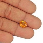 2.46-Carat Lustrous Yellowish Orange Oval-Cut Tajik Clinohumite