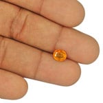 1.34-Carat Yellowish Orange Oval-Cut Clinohumite from Tajikistan