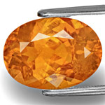 6.37-Carat Lustrous Intense Orange Oval-Cut Tajik Clinohumite