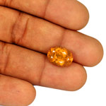 6.37-Carat Lustrous Intense Orange Oval-Cut Tajik Clinohumite