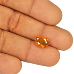 4.02-Carat Intense Orange Oval-Cut Clinohumite from Tajikistan