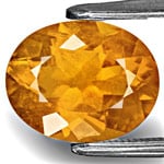 2.77-Carat Eye-Clean Lustrous Golden Orange Clinohumite