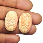 45.20-Carat Matched Pair of Oval-Cut Carved Japanese Corals