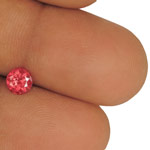 0.68-Carat Round-Cut Velvety Orangy Pink Spinel from Tanzania