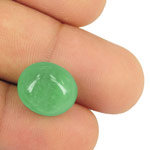 13.33-Carat Oval Cabochon-Cut Medium Green Colombian Emerald