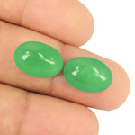 17.04-Carat Pair of Lively Green Cabochon-Cut Colombian Emeralds