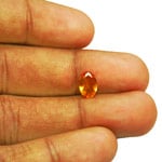 1.02-Carat Lustrous Orange Oval Cut Clinohumite from Tanzania