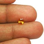 0.45-Carat High-Clarity Fiery Orange Tanzanian Clinohumite