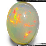 3.71-Carat Yellowish White Opal with Multi-Color Flashes