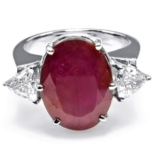 14K Gold Ring mounted with an African Ruby & 2 Trilliant diamonds